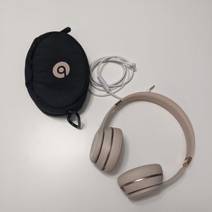 Rose gold Beats headphones